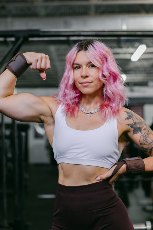 woman flexing bicep 